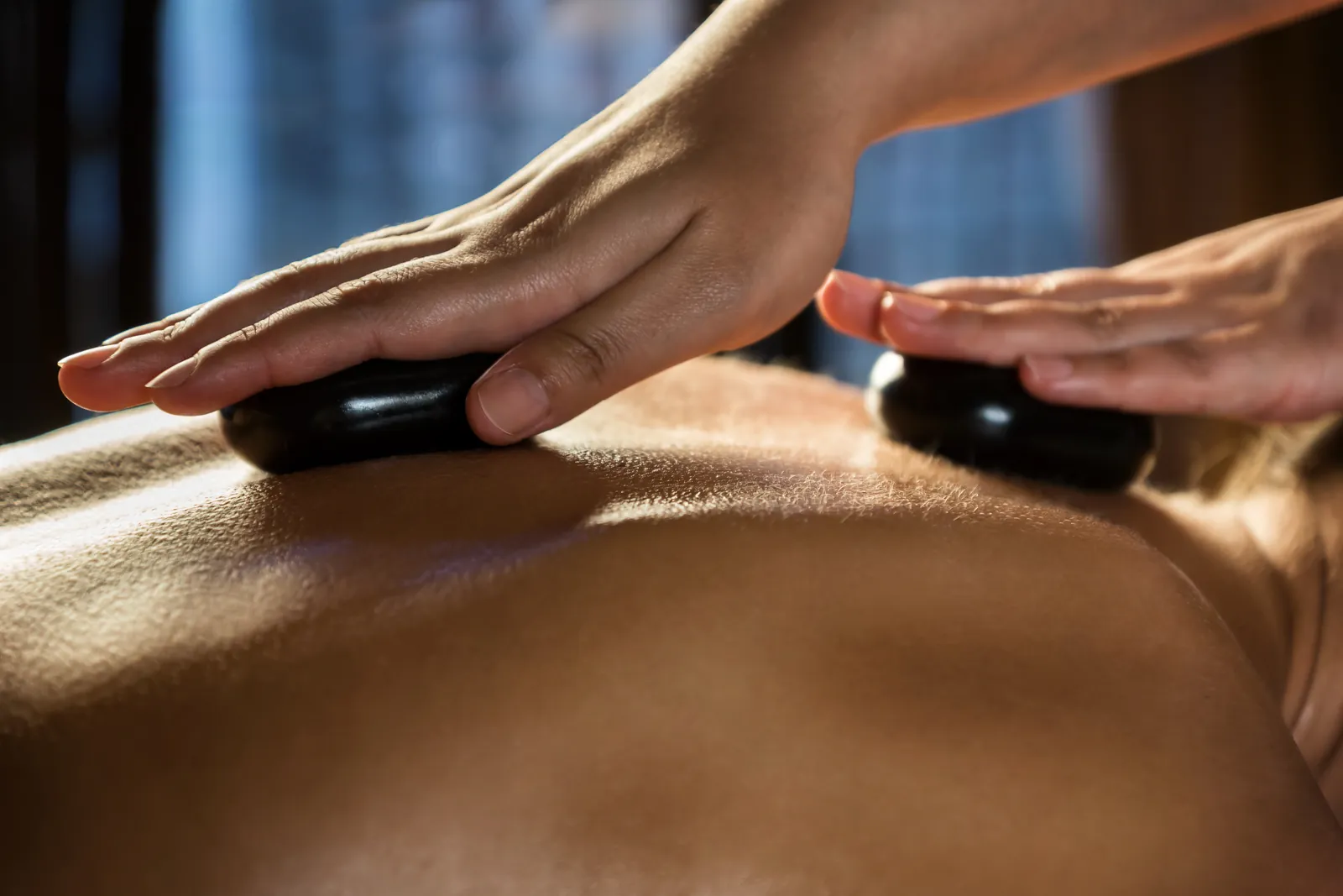 Hot stones massage in Brisbane City – deep relaxation and warmth